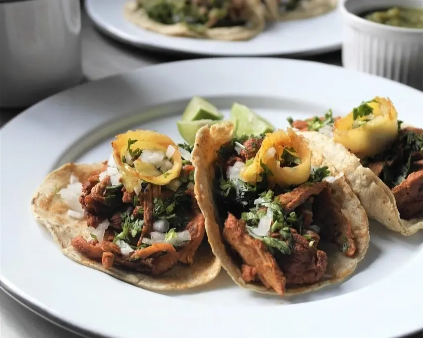 Tacos with pork and pineapple